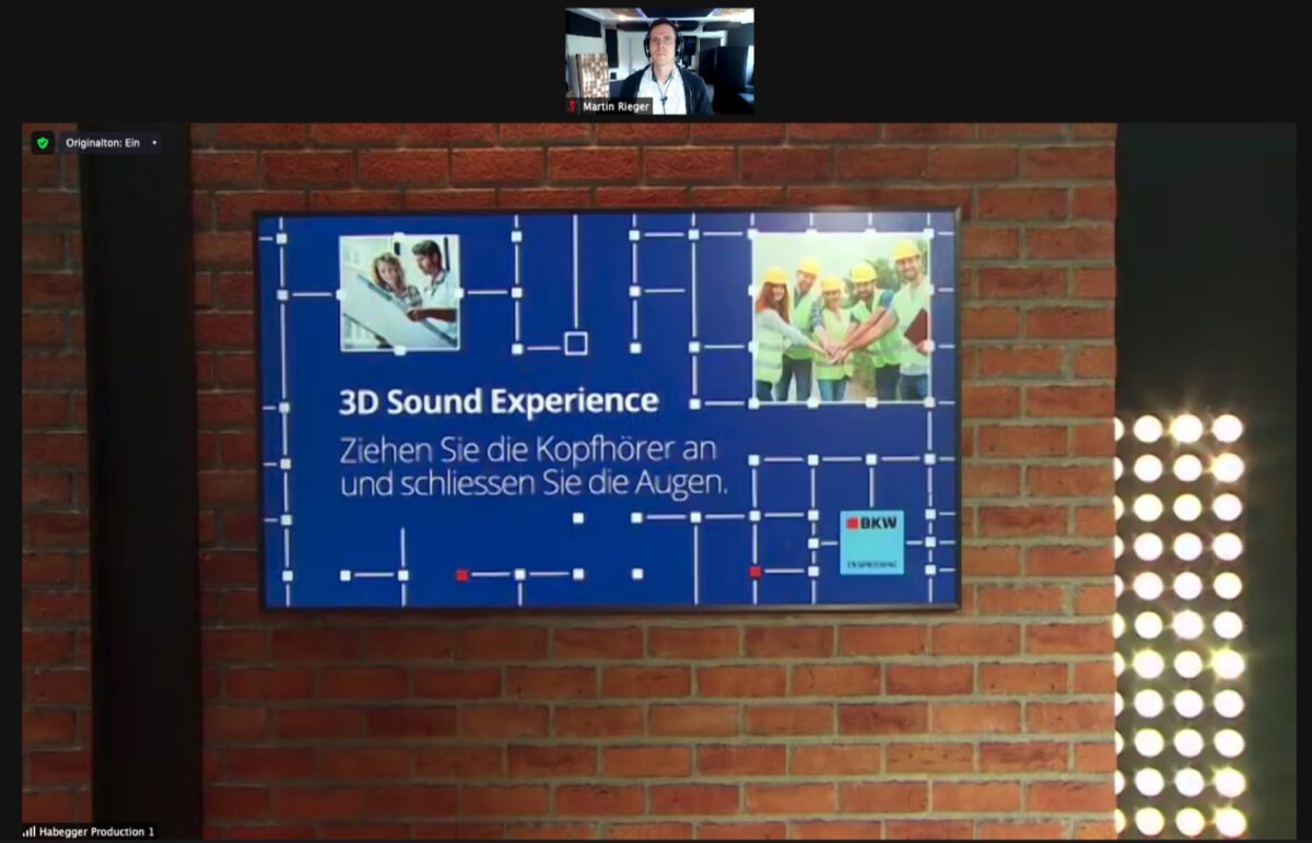 Messewand mit Kopfhoererstationen fuer eine 3D-Sound-Experience