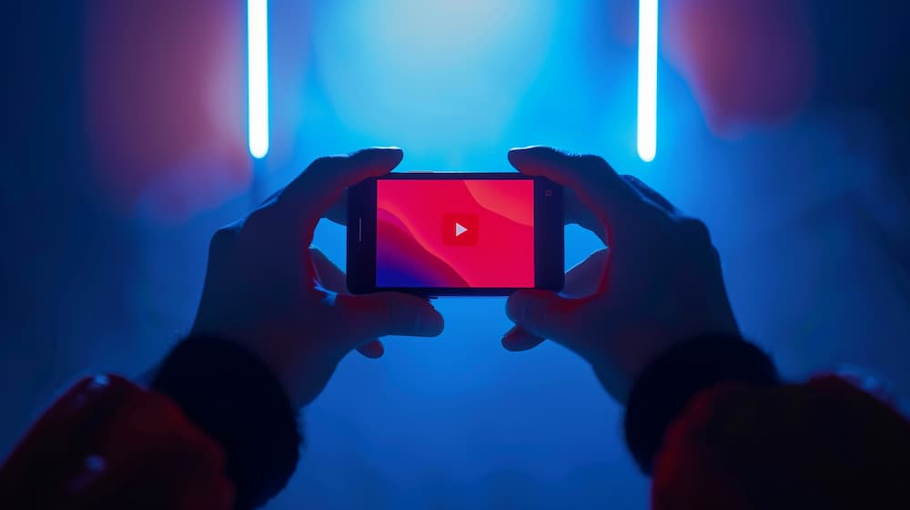 A_close-up_of_hands_holding_a_smartphone_displaying_a